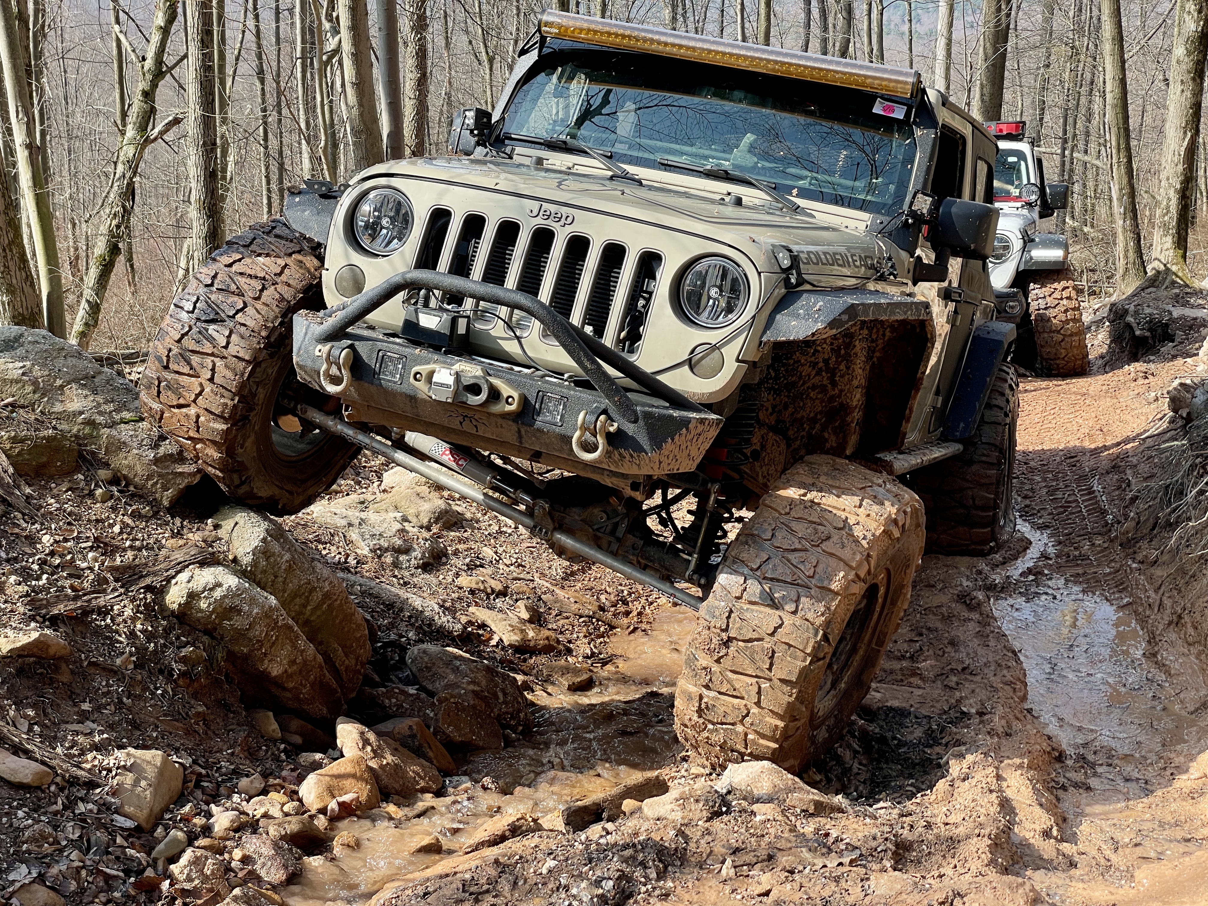 Jeep on a Muddy Trail